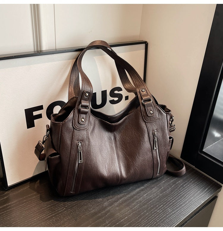 NOEMIE™ - Klassische Leder-Tote-Tasche