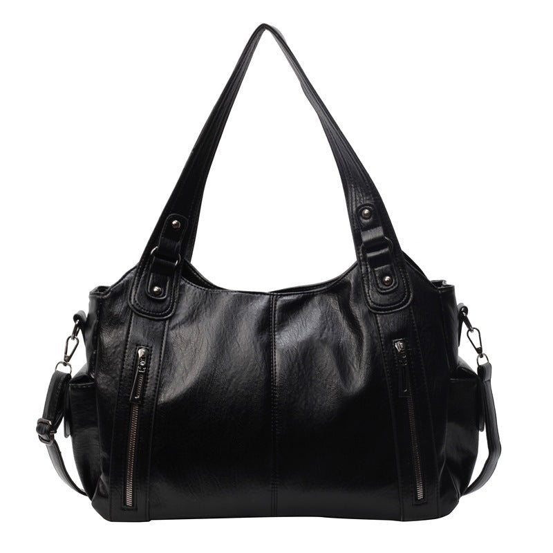NOEMIE™ - Klassische Leder-Tote-Tasche